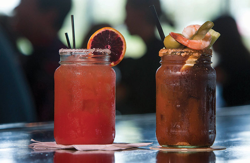 Blood Orange Margarita, left, and the Loaded Bloody Mary from The Mason Jar Tavern.