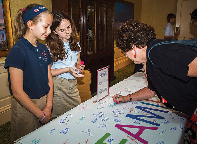 Photo courtesy of CHSNC, a scene from the 2016 A Place to Call Home event, an annual fundraiser of the Children’s Home Society of North Carolina. This year’s event is set for April 27 at the Angus Barn in Raleigh.
